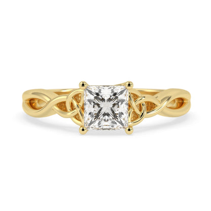 A yellow gold ring with a princess-cut clear diamond center stone, set on a white background.