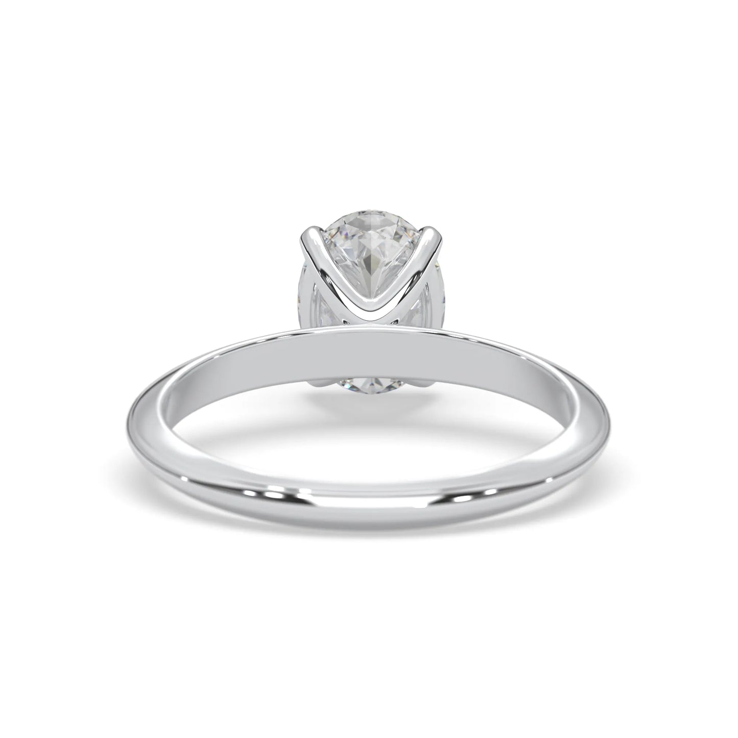 white-gold ring with a clear gemstone on a white background