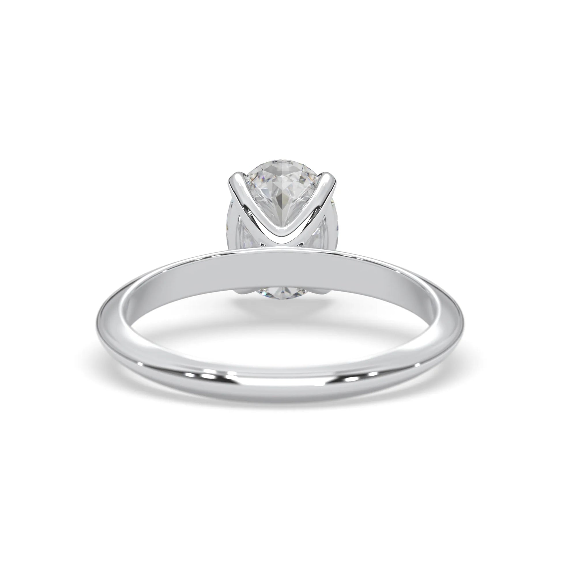 white-gold ring with a clear gemstone on a white background