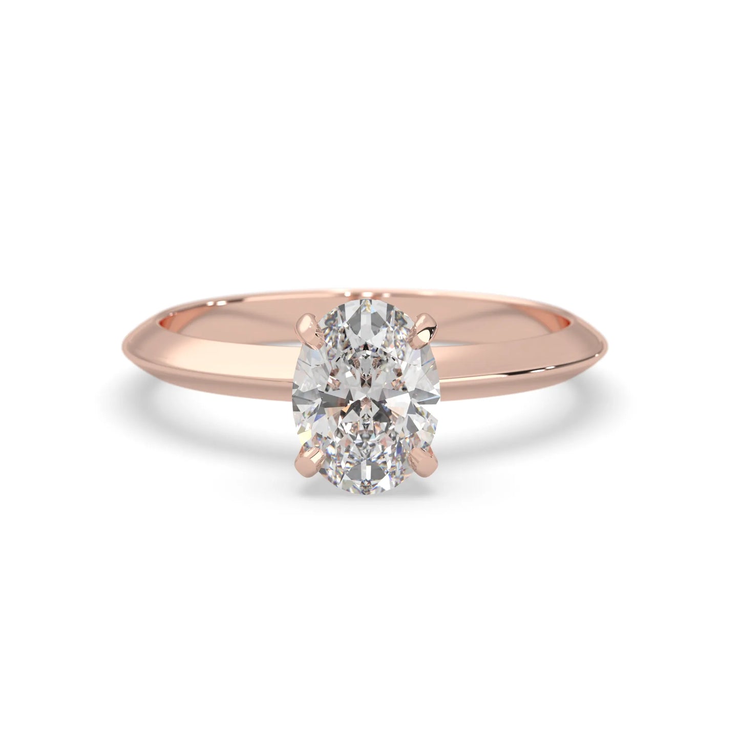 Rose-gold ring with a diamond on a white background