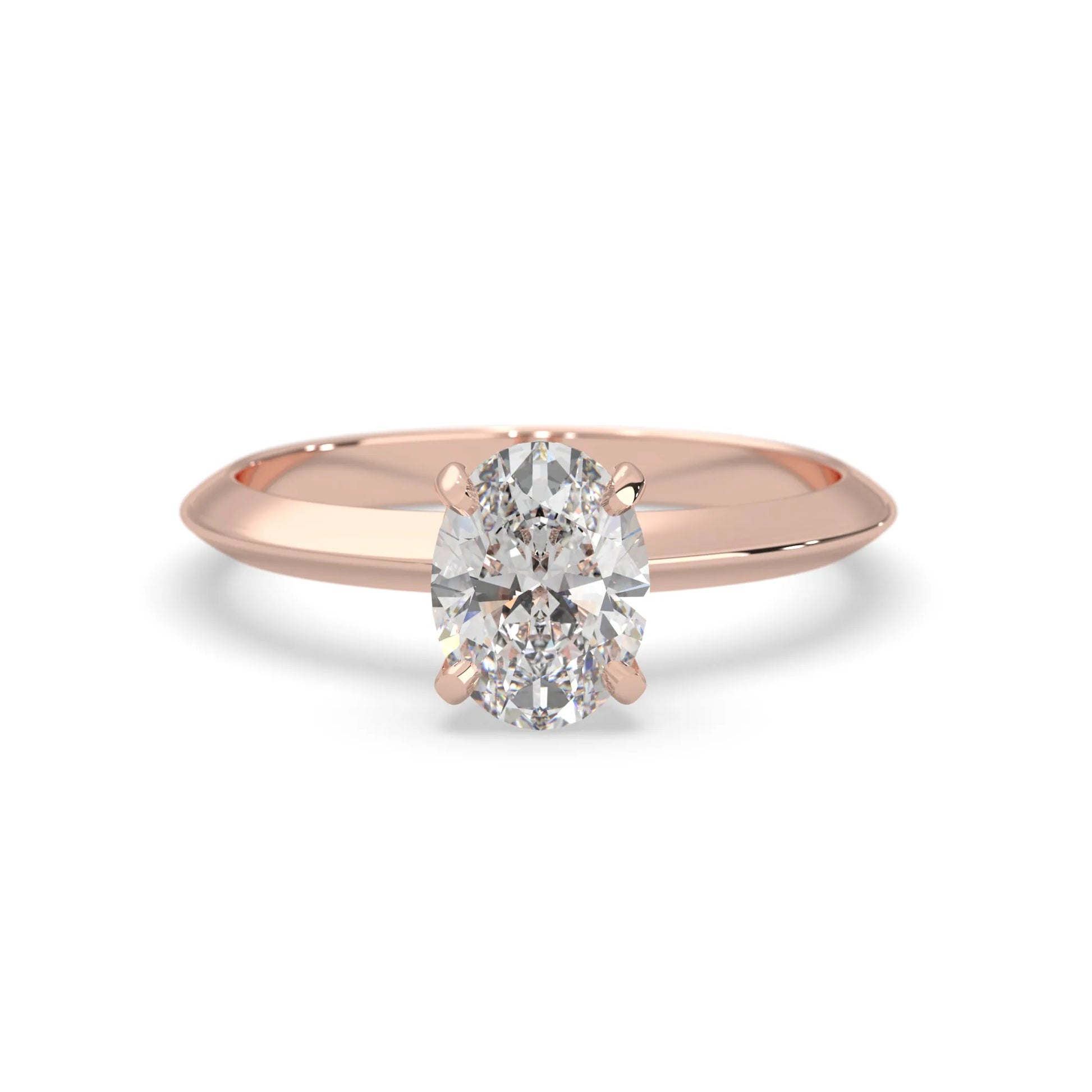 Rose-gold ring with a diamond on a white background
