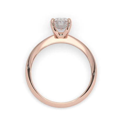 Rose-gold ring with a diamond on a white background