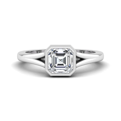 Asscher cut lab grown diamond bezel set split shank engagement ring in white gold design.