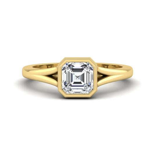 Asscher cut lab grown diamond bezel set split shank engagement ring in yellow gold design.