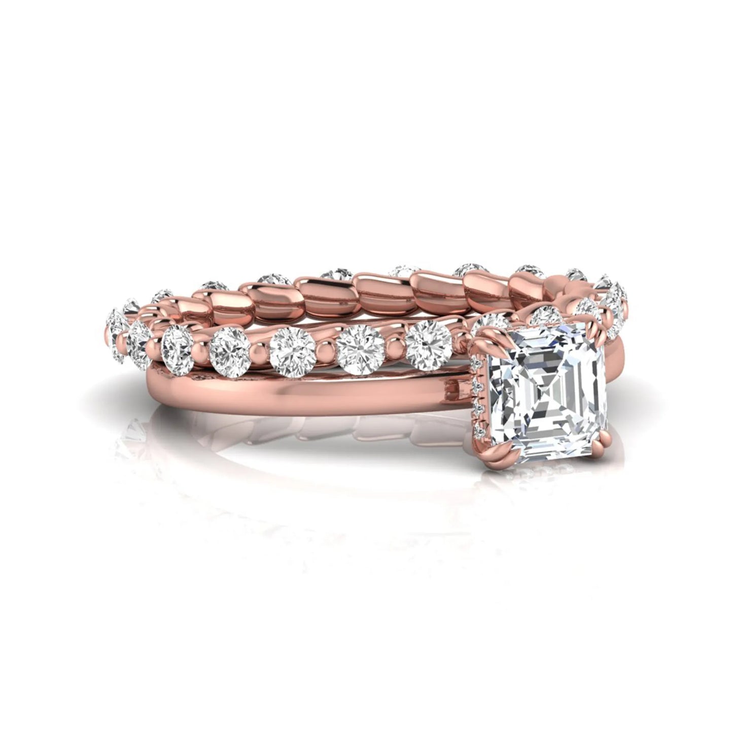 Asscher cut lab grown diamond bridal ring set featuring a four-prong solitaire engagement ring with a matching round diamond wedding band in rose gold tone.