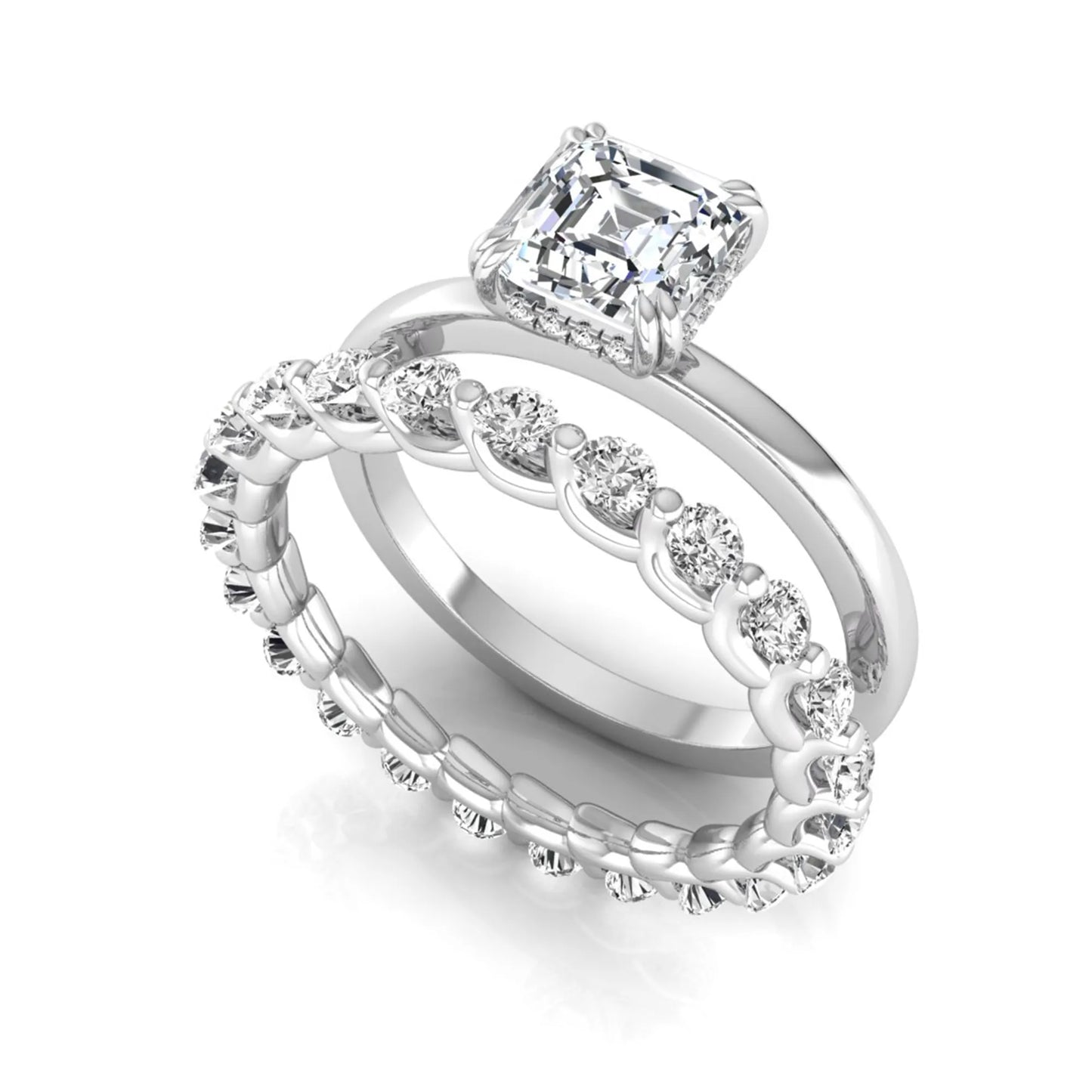 Asscher cut lab grown diamond bridal ring set featuring a four-prong solitaire engagement ring with a matching round diamond wedding band in white gold tone.