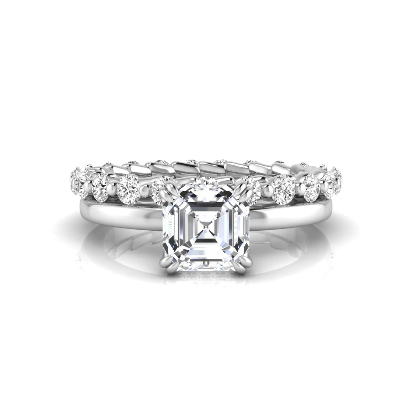 Asscher cut lab grown diamond bridal ring set featuring a four-prong solitaire engagement ring with a matching round diamond wedding band in white gold tone.