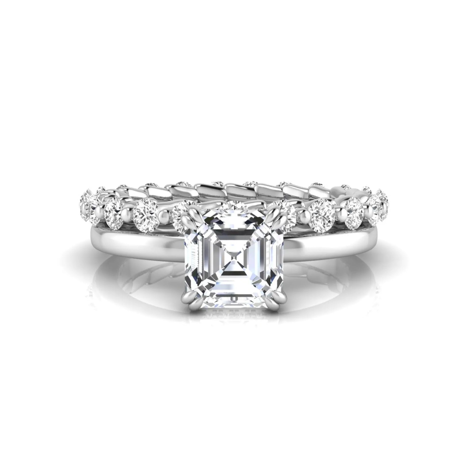 Asscher cut lab grown diamond bridal ring set featuring a four-prong solitaire engagement ring with a matching round diamond wedding band in white gold tone.