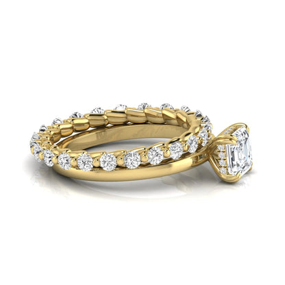Asscher cut lab grown diamond bridal ring set featuring a four-prong solitaire engagement ring with a matching round diamond wedding band in yellow gold tone.