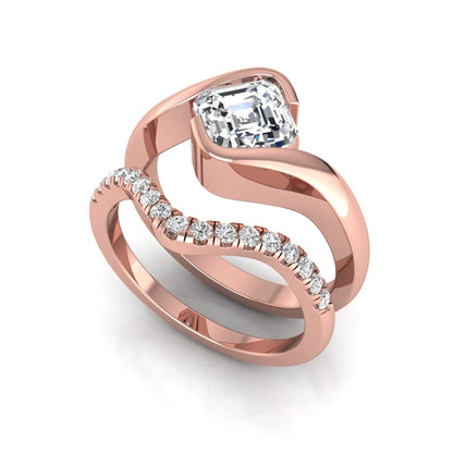 Asscher cut lab grown diamond bridal ring set with pavé contour wedding band in rose gold metal tone.