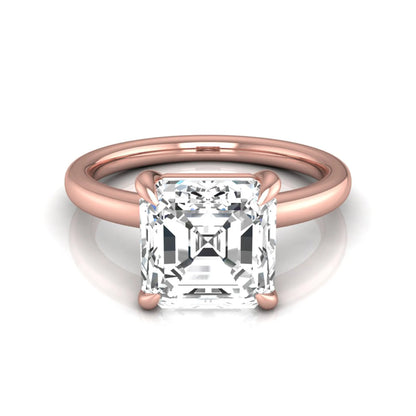 Asscher cut lab grown diamond solitaire engagement ring featuring a classic four-prong setting with a rose gold tone band.