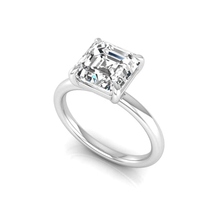 Asscher cut lab grown diamond solitaire engagement ring featuring a classic four-prong setting with a white gold tone band.