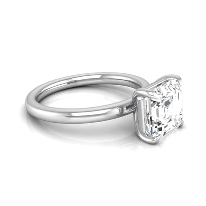 Asscher cut lab grown diamond solitaire engagement ring featuring a classic four-prong setting with a white gold tone band.