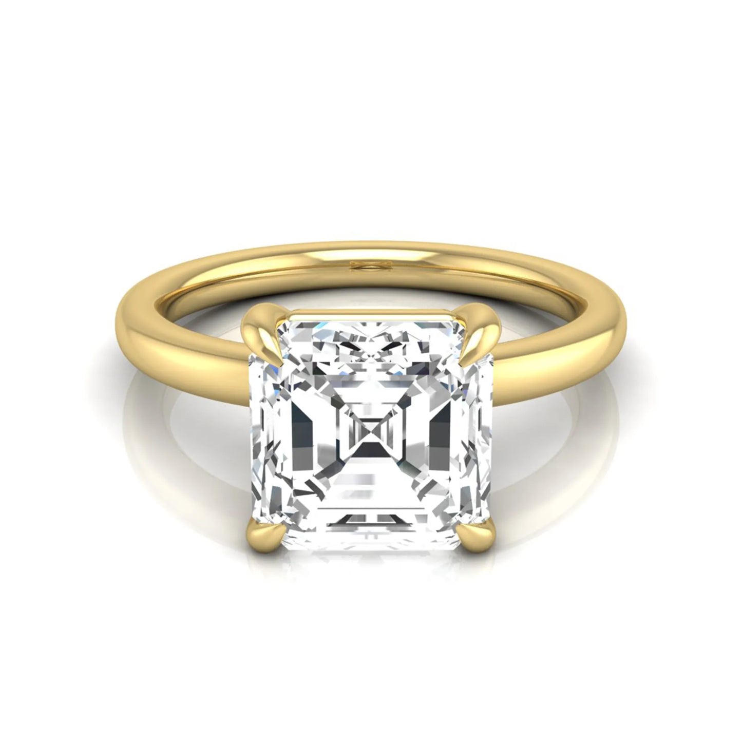 Asscher cut lab grown diamond solitaire engagement ring featuring a classic four-prong setting with a yellow gold tone band.