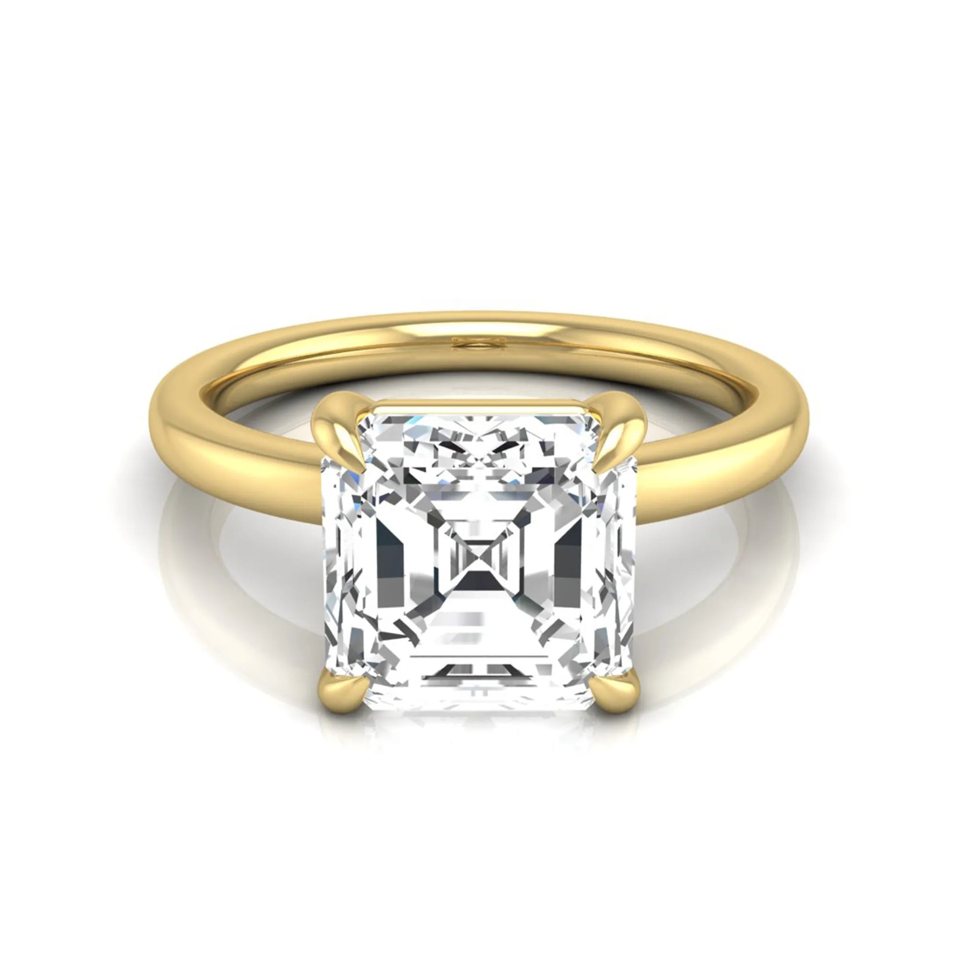 Asscher cut lab grown diamond solitaire engagement ring featuring a classic four-prong setting with a yellow gold tone band.