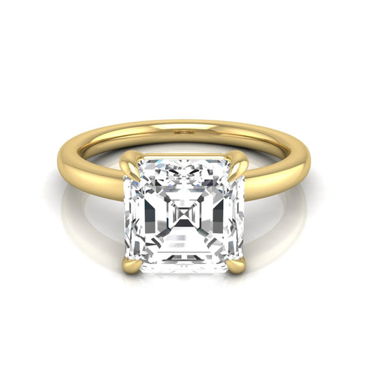 Asscher cut lab grown diamond solitaire engagement ring featuring a classic four-prong setting with a yellow gold tone band.