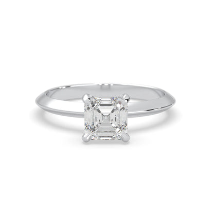white-gold ring with a diamond on a white background