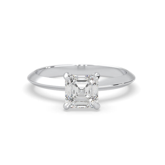 white-gold ring with a diamond on a white background
