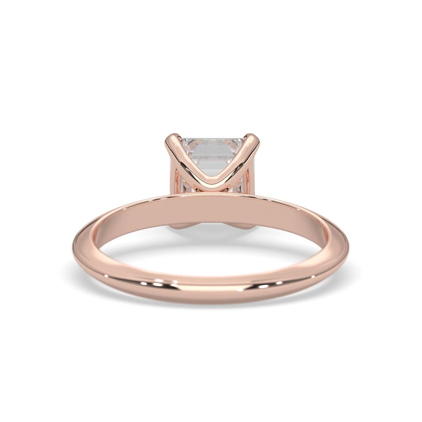 Rose-gold ring with a diamond on a white background
