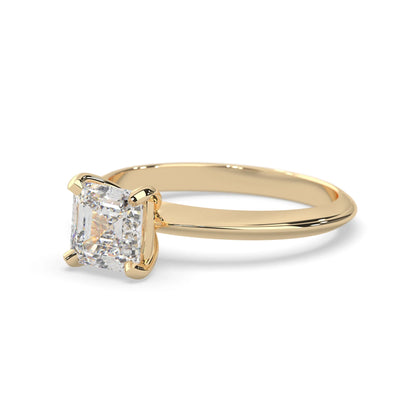 yellow-Gold ring with a large diamond on a white background