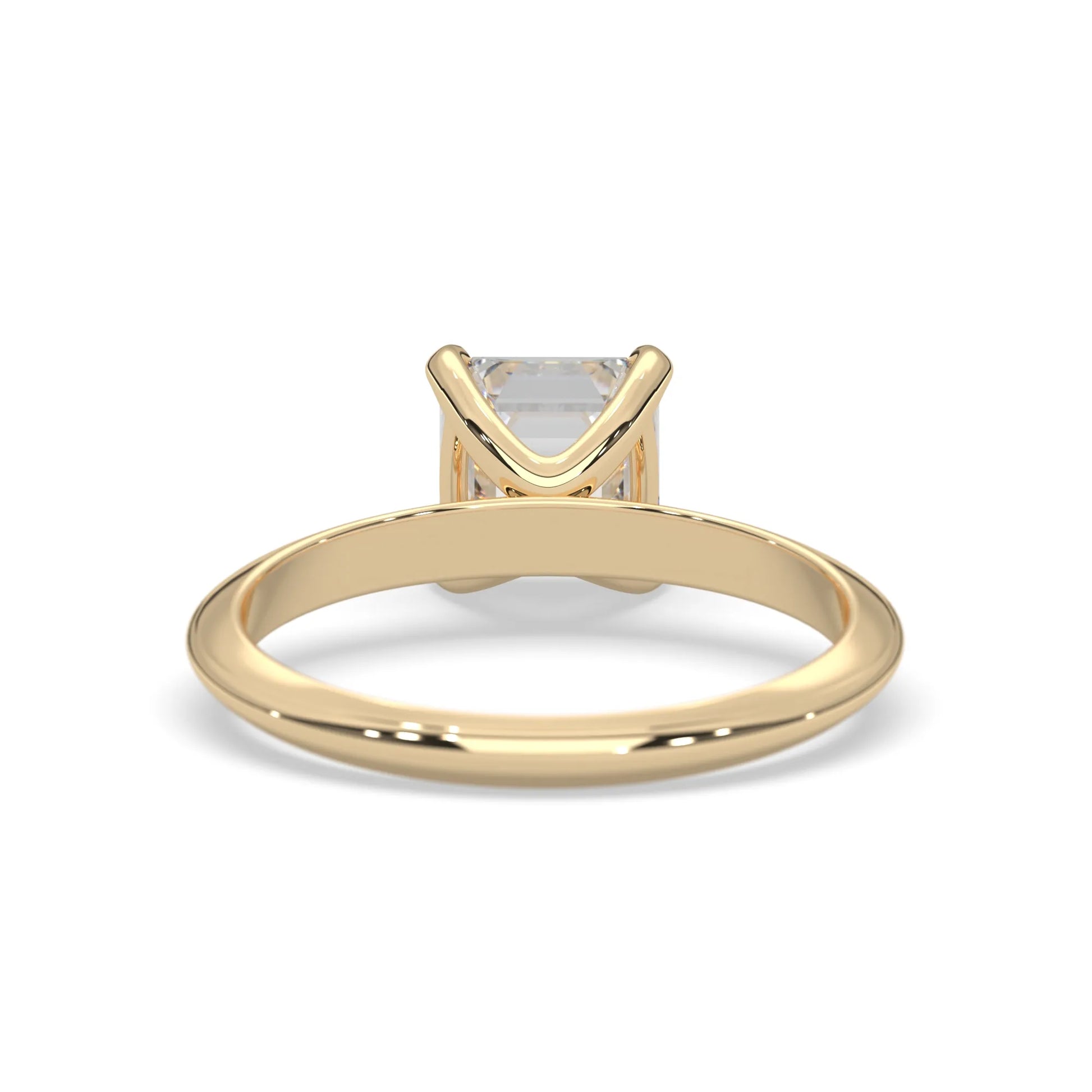yellow-Gold ring with a diamond on a white background