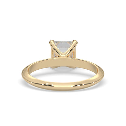 yellow-Gold ring with a diamond on a white background