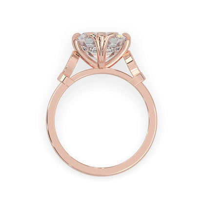 Asscher cut lab grown diamond seven stone pavé engagement ring with round diamond accents and a rose gold-toned metal design