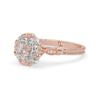 Asscher cut lab grown diamond seven stone pavé engagement ring with round diamond accents and a rose gold-toned metal design
