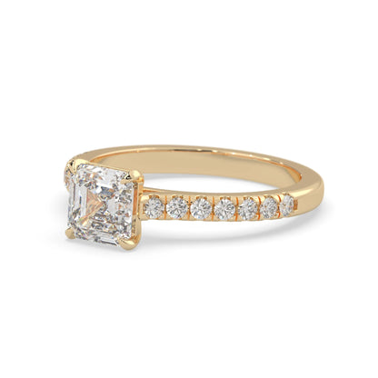 asscher cut lab grown diamond prong set engagement ring with pavé band and yellow gold  metal tone design