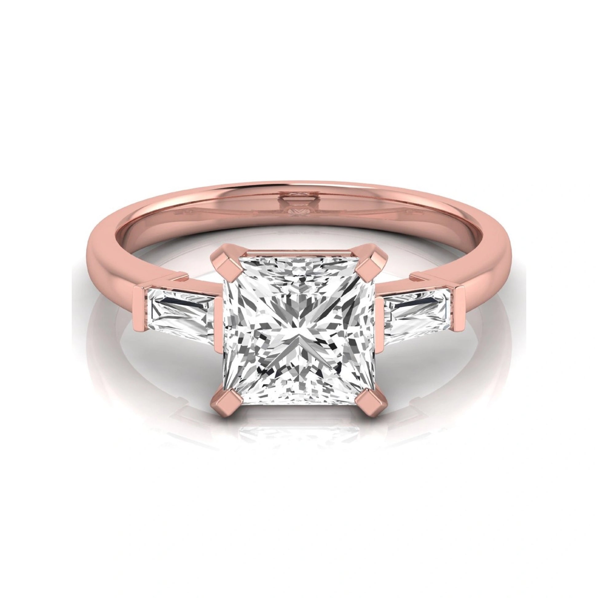 Asscher cut lab grown diamond three stone engagement ring featuring a 2.40 carat Asscher center diamond with baguette side diamonds in a classic prong setting in rose gold
