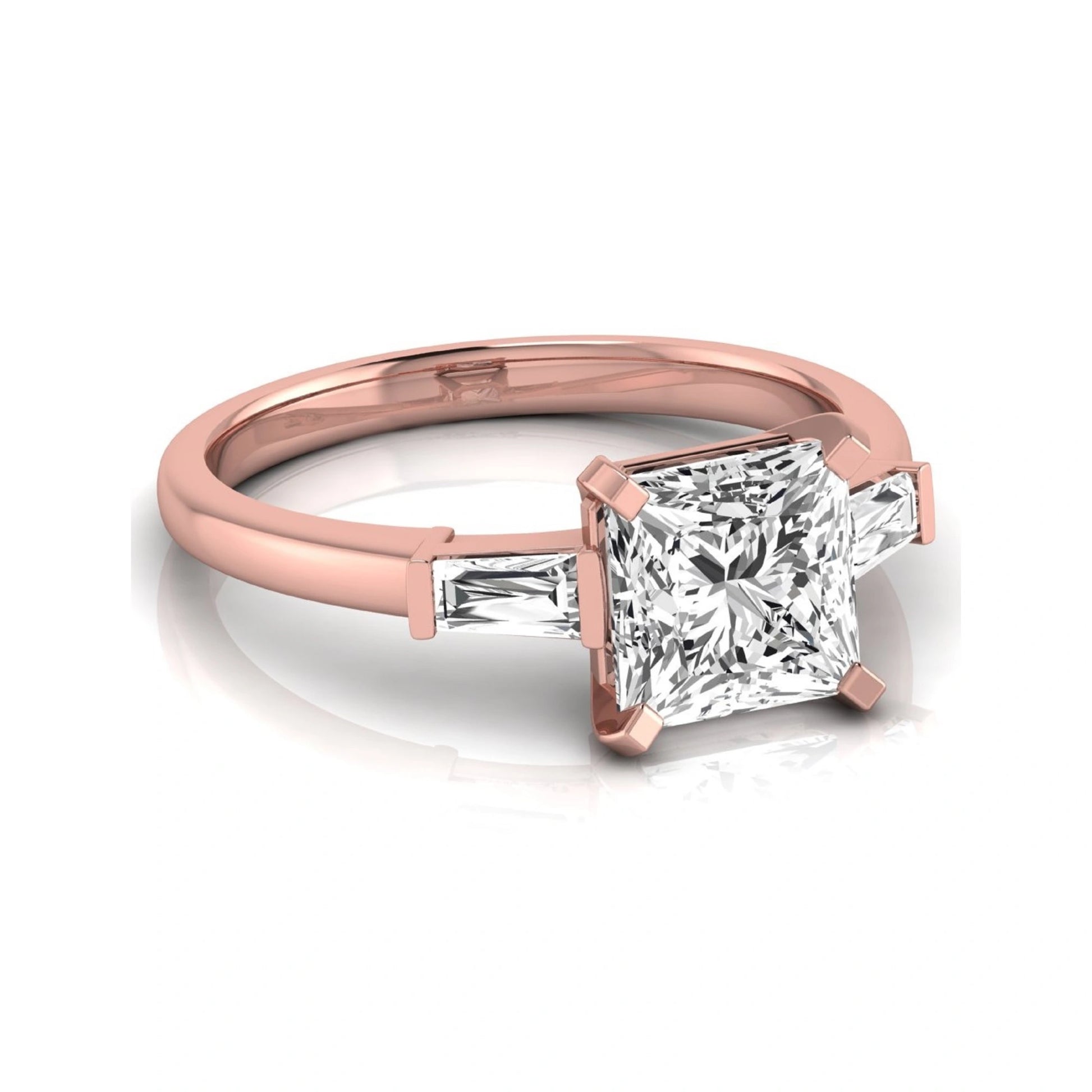 Asscher cut lab grown diamond three stone engagement ring featuring a 2.40 carat Asscher center diamond with baguette side diamonds in a classic prong setting in rose gold