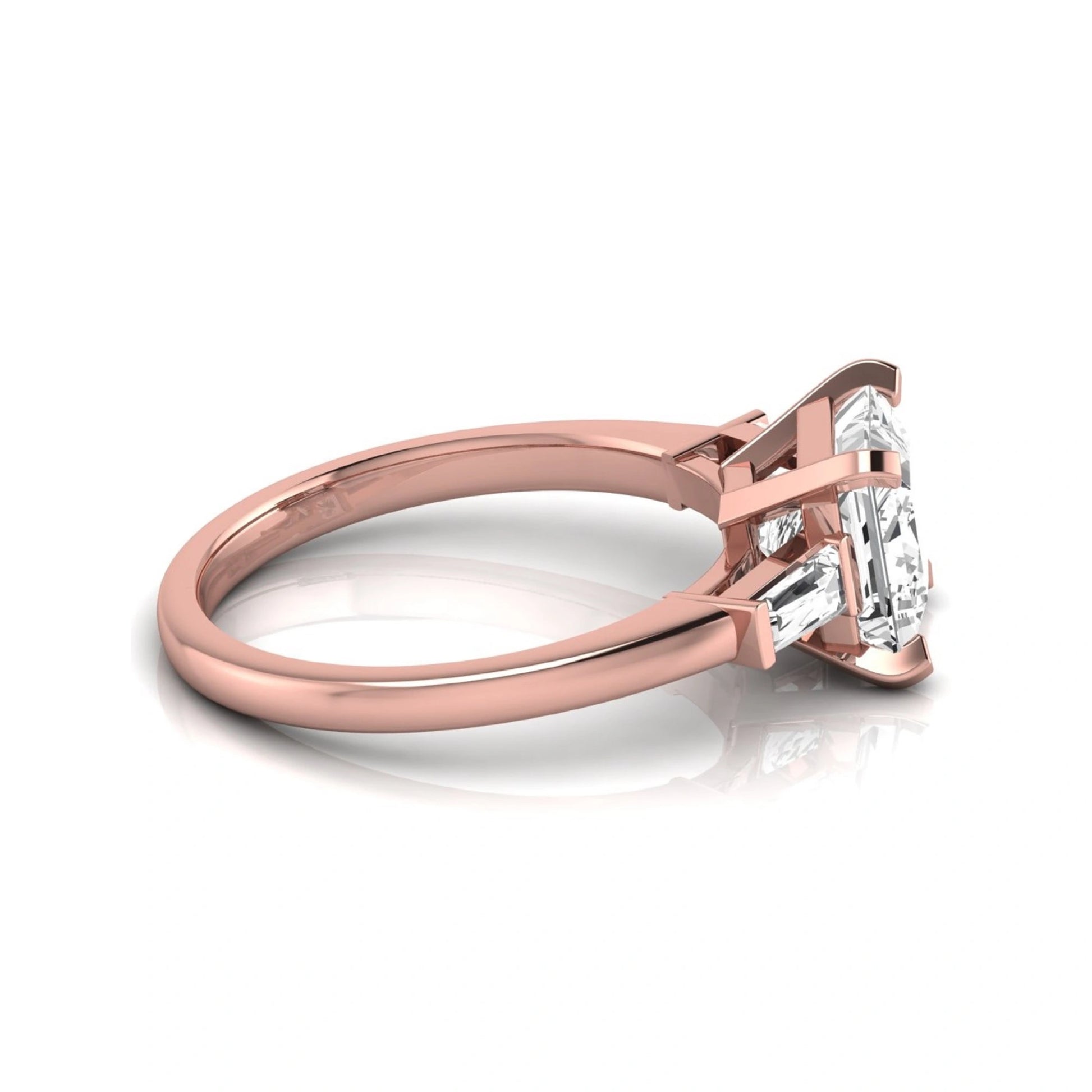 Asscher cut lab grown diamond three stone engagement ring featuring a 2.40 carat Asscher center diamond with baguette side diamonds in a classic prong setting in rose gold