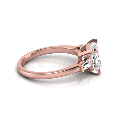 Asscher cut lab grown diamond three stone engagement ring featuring a 2.40 carat Asscher center diamond with baguette side diamonds in a classic prong setting in rose gold