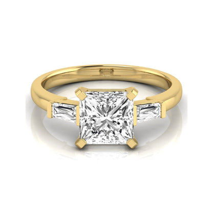 Asscher cut lab grown diamond three stone engagement ring featuring a 2.40 carat Asscher center diamond with baguette side diamonds in a classic prong setting in yellow gold