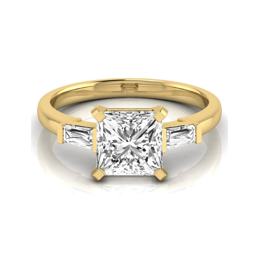 Asscher cut lab grown diamond three stone engagement ring featuring a 2.40 carat Asscher center diamond with baguette side diamonds in a classic prong setting in yellow gold