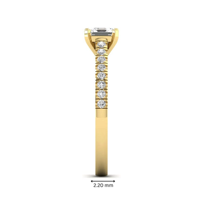 Asscher cut lab grown diamond solitaire engagement ring featuring a four-prong center diamond with a pavé-set round diamond band in a yellow gold finish.