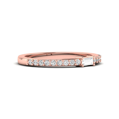 Baguette cut lab grown diamond band ring featuring a bar-prong set center diamond with round accent diamonds on a slim rose gold style band.
