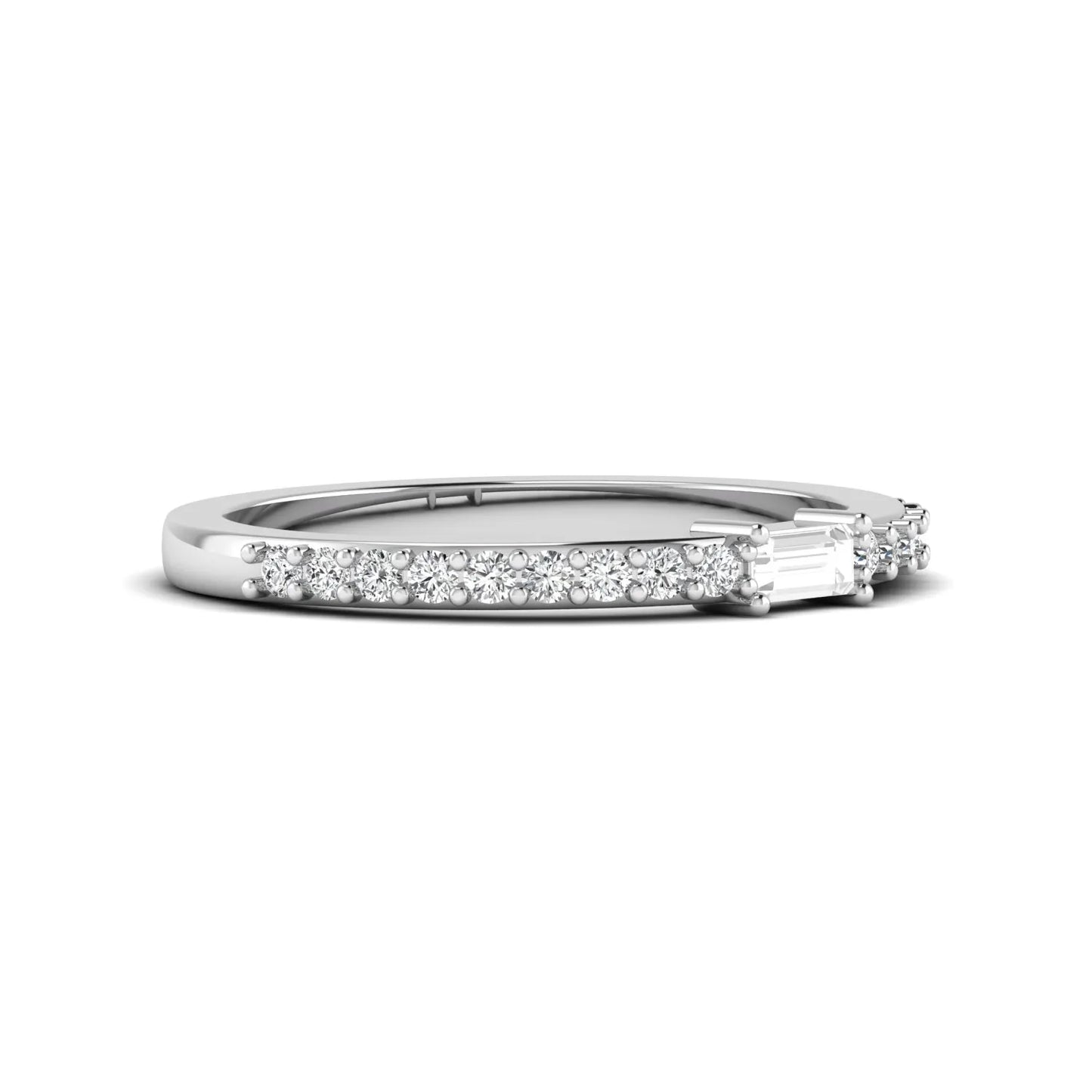 Baguette cut lab grown diamond band ring featuring a bar-prong set center diamond with round accent diamonds on a slim white gold style band.