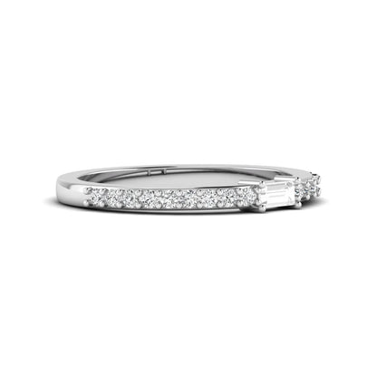 Baguette cut lab grown diamond band ring featuring a bar-prong set center diamond with round accent diamonds on a slim white gold style band.
