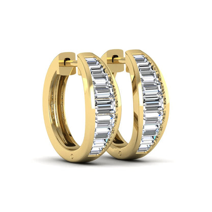 Baguette channel set lab grown diamond hoop earrings featuring a modern hinged hoop design in a yellow gold finish.