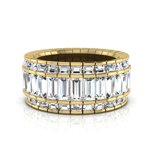 Full eternity band featuring baguette cut lab grown diamonds in a channel-style setting with a yellow gold tone finish.