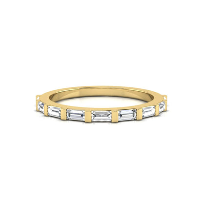 yellow gold Baguette cut lab grown diamond half eternity band ring with sleek bar setting in a modern minimalist design