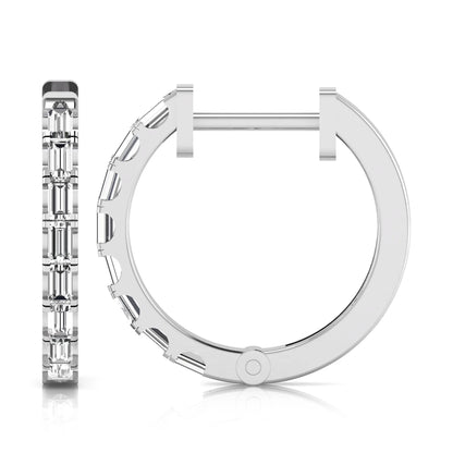 Lab grown diamond huggie hoop earrings featuring vertically arranged baguette cut diamonds in a sleek linear design on a white gold hinged hoop.