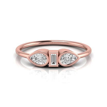 Rose-gold ring with three diamond settings on a white background