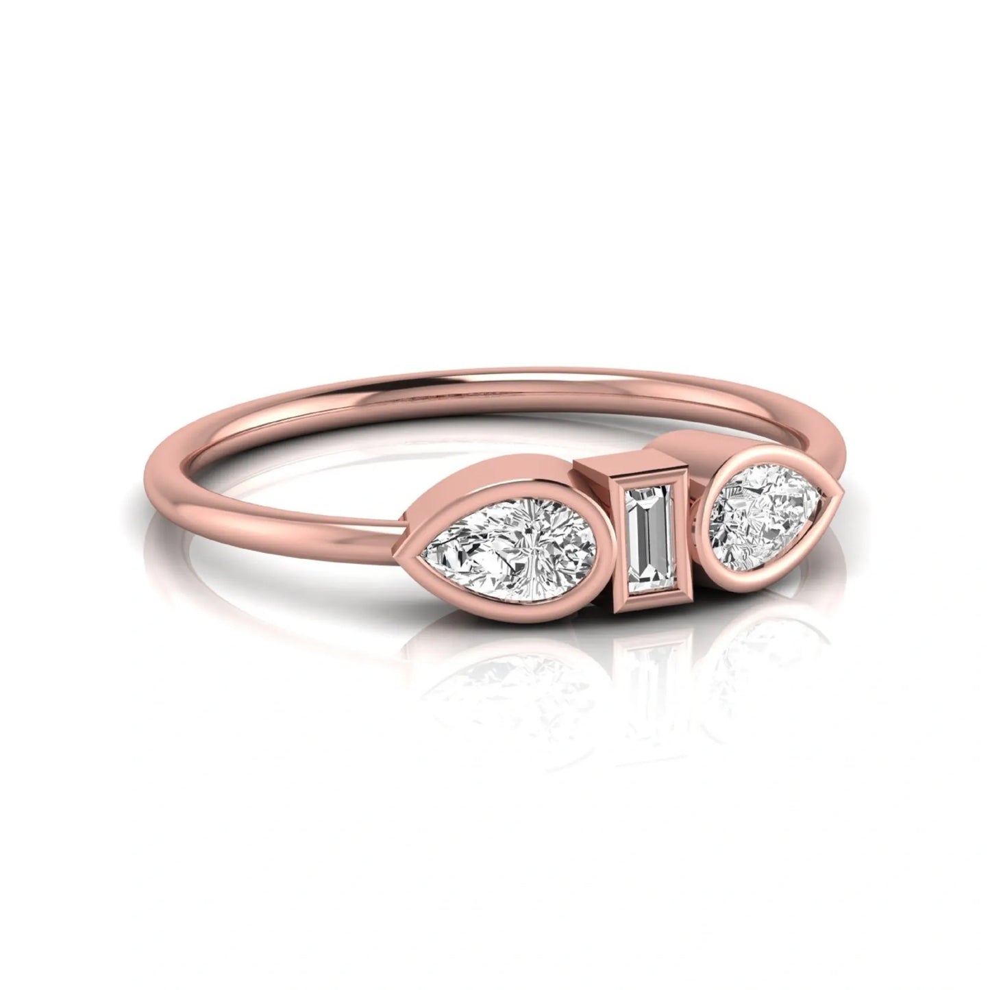 Rose-gold ring with three diamonds on a white background