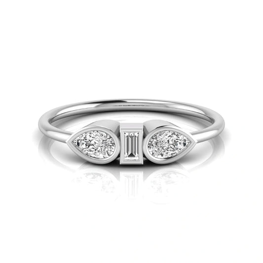 white-gold ring with two pear-shaped diamonds and a baguette diamond on a white background