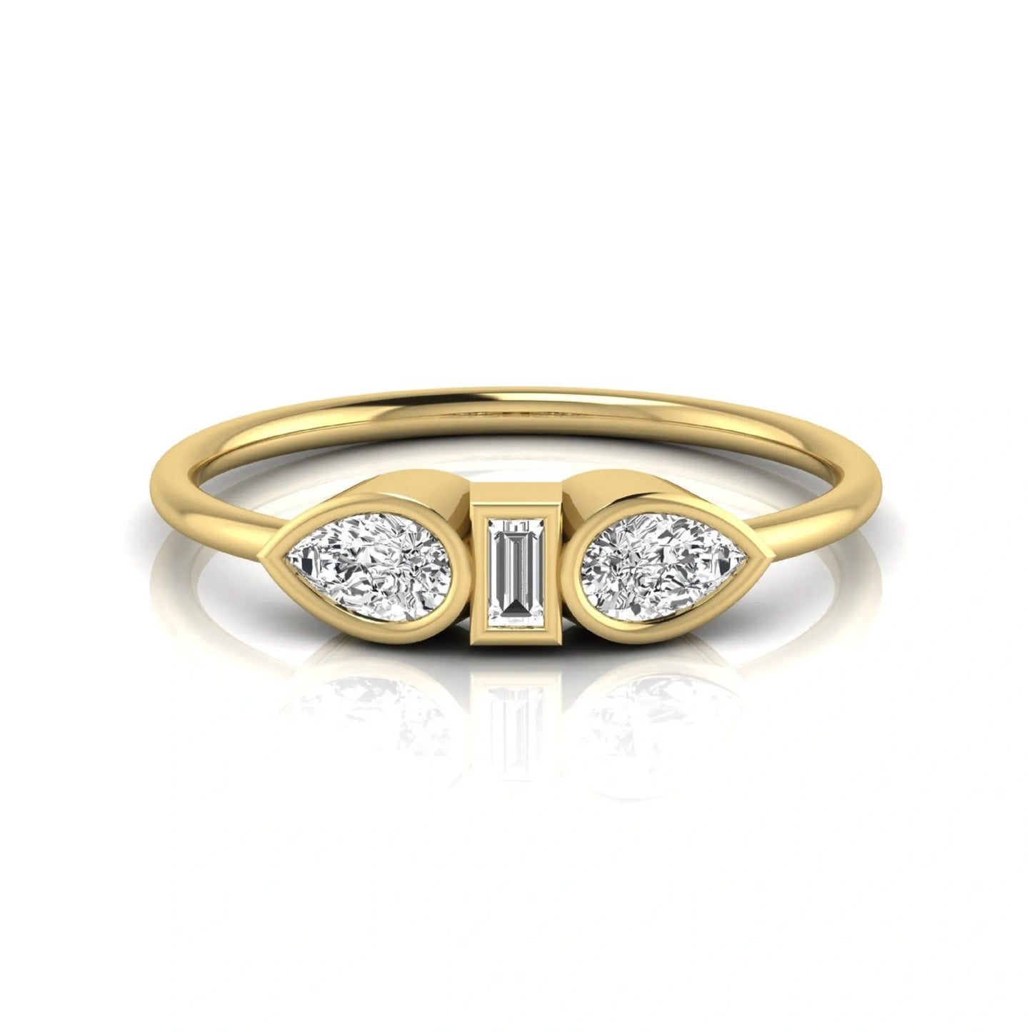 yellow-Gold ring with three diamond stones on a white background