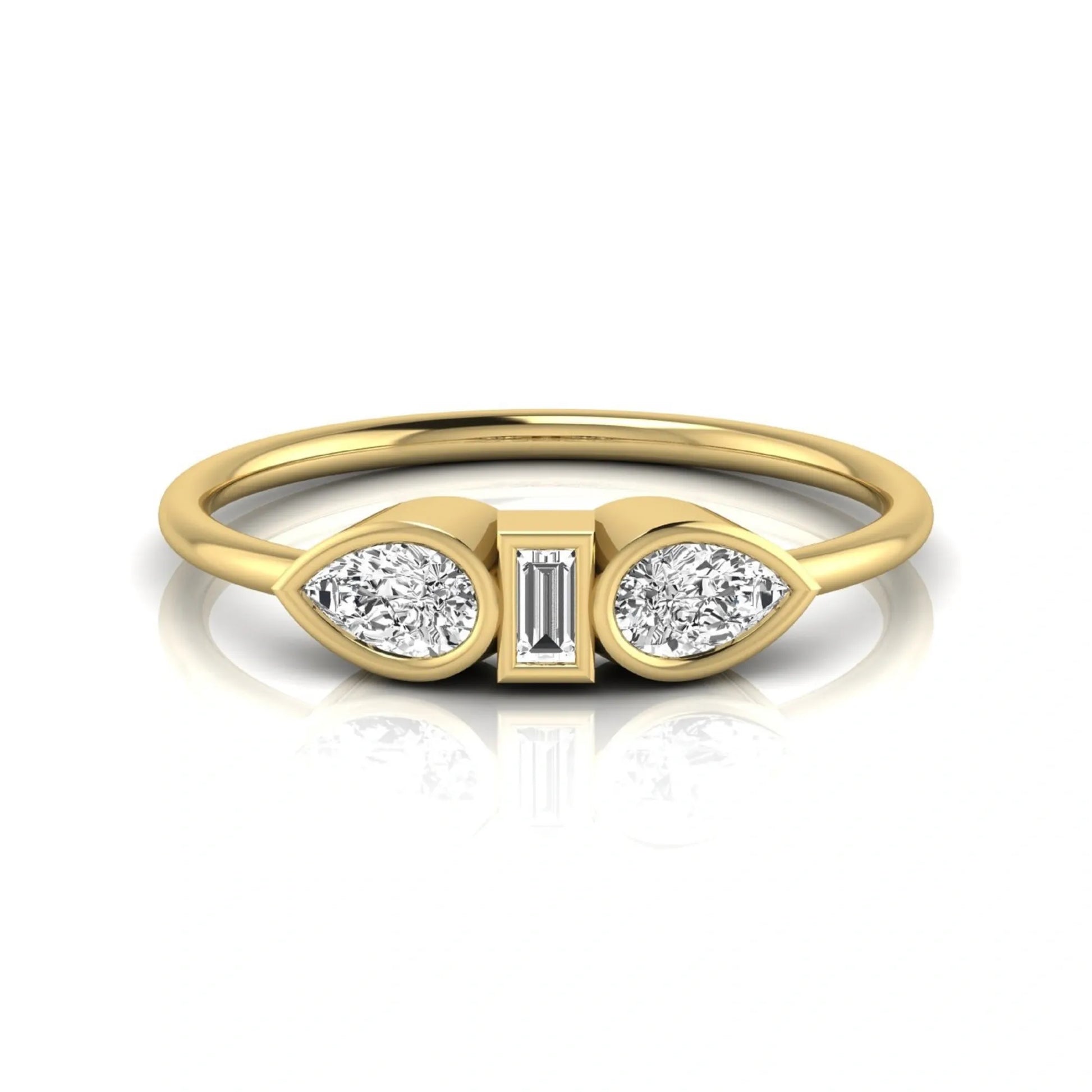 yellow-Gold ring with three diamond stones on a white background