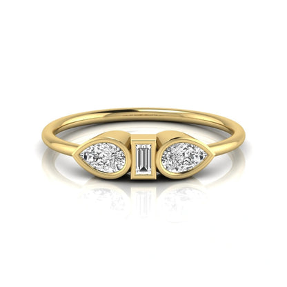 yellow-Gold ring with three diamond stones on a white background