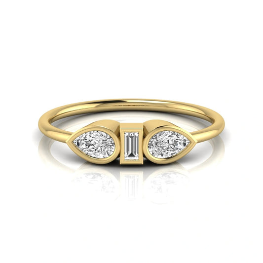 yellow-Gold ring with three diamond stones on a white background